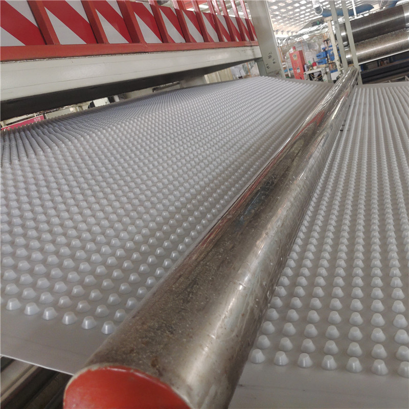 خط إنتاج ألواح الصرف الصحي.jpg